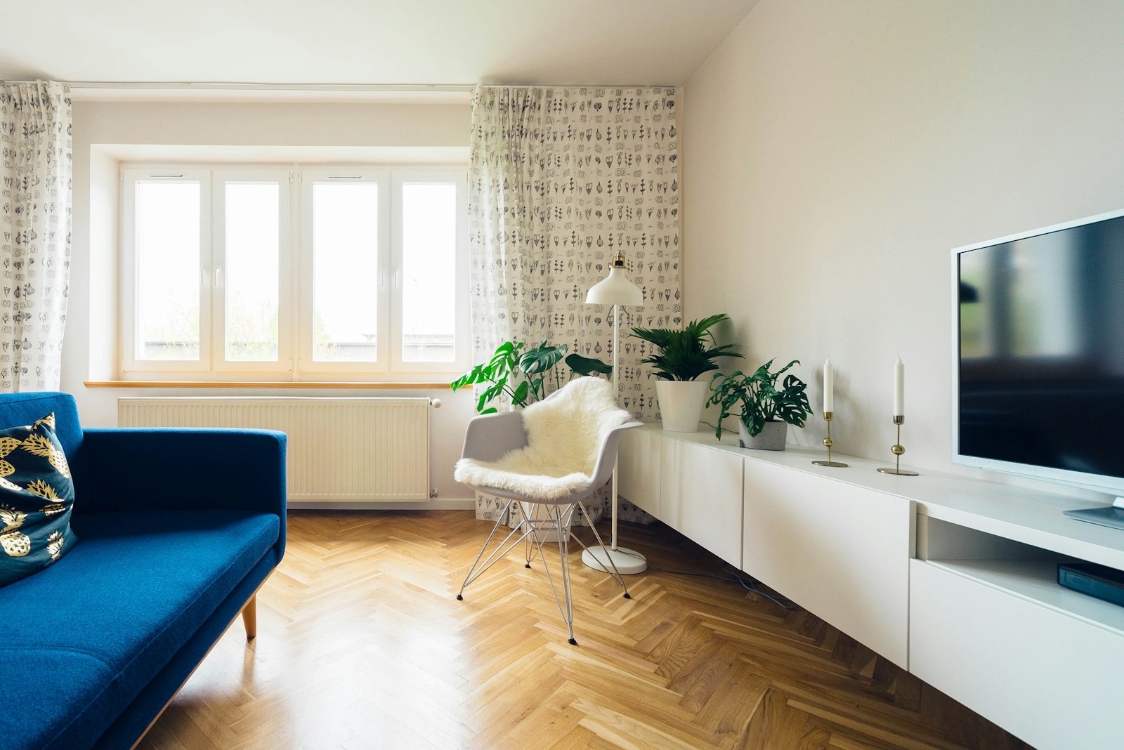 A1 one bedroom interior, bright living room with a balcony